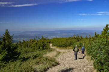two tourists on the trail from Korbielów to Pilsko in the Beskid Mountains