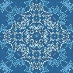 Elegant snowflake mandala vector seamless pattern in icy blue, white, and teal hues. The color scheme creates a gradient and glow effect. Perfect for winter-themed digital designs, social media