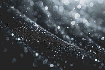 Mostly black background with a few bokeh lights - minimal - photo-realistic.