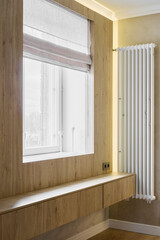 This modern minimalist window design features warm lighting that creates a cozy atmosphere