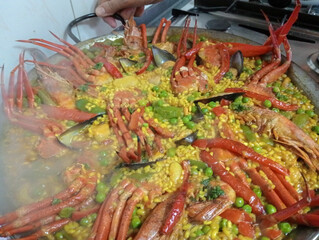 Close-up of a plate of seafood paella, a traditional Spanish dish