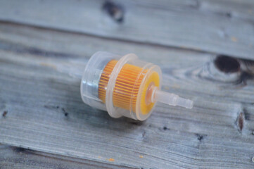 New fuel filter for a car, a filter used to screen out foreign particles or liquids from the fuel...