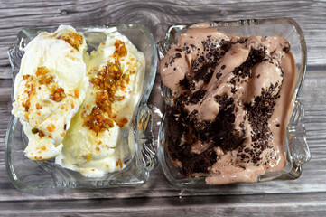 Assorted Ice cream, Mistika Mastic Pistachio ice cream flavored with caramel sauce, caramelized mastic with pistachios pieces on its top and Chocolate ice cream with brownies cake and chocolate pieces