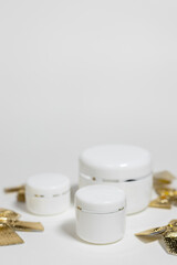 Minimalist Cosmetic Packaging with Golden Details