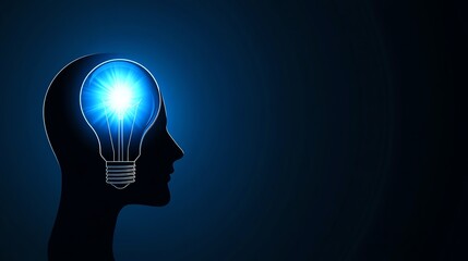 A lightbulb inside the head of a silhouette.