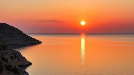 Obraz premium Travel image showing the orange sky of the sunset over the sea