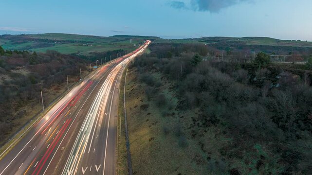 Time lapse video over Scammonden bridge in Kirklees, west Yorkshire early evening showing the traffic and the countryside landscape. 