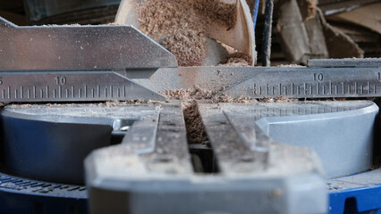 Close-Up of a Circular Saw with Sawdust Accumulation 