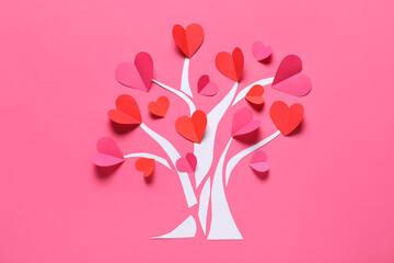 Tree made of paper hearts on pink background. St. Valentine's Day.