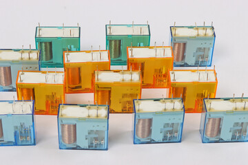 Electromagnetic relays for control in automation circuits. Close-up. Soft focus.