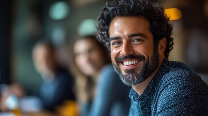 Fototapeta premium Happy Man Smiling with Friends in Background