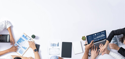 Group of office worker and businesspeople working on business financial data analysis. Empty space with editable blank background meeting table for customer design. Prudent