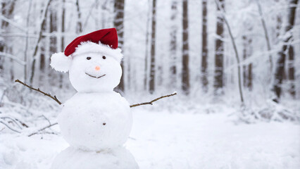 Smiling snowman waring Santa hat 