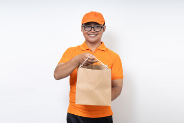 asian courier delivery wearing oranges uniform with paper bag isolated on white background, shipment service concept.