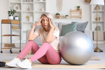 Sporty woman experiencing menopause at home