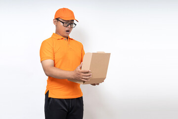 asian courier delivery wearing oranges uniform with parcel box isolated on white background, shipment service concept.