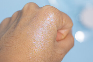 Fototapeta premium Test color by applying eyeshadow on the back of your hand