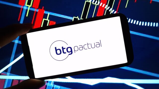 Konskie, Poland - November 30, 2024: BTG Pactual company logo displayed on mobile phone