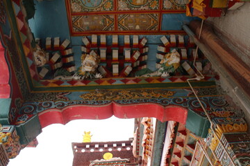 Obraz premium Drug Dje Tibetan monastery of Padma Drukpa in Litang County, Garze Tibetan Autonomous Prefecture. Sichuan, China.Sertar county, Sichuan, China - May 16, 2014: View of Academy building interior w