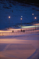 Local Mongolian boys are skiing on snow in sky resort in Ulaanbaatar