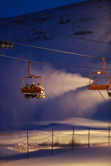 Local Mongolian boys are skiing on snow in sky resort in Ulaanbaatar