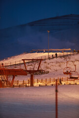 Local Mongolian boys are skiing on snow in sky resort in Ulaanbaatar