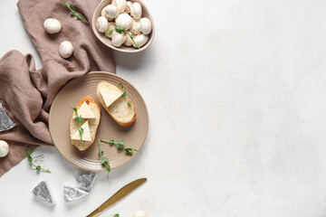 Composition with triangles of tasty processed cheese, bread, micro green and mushrooms on light background