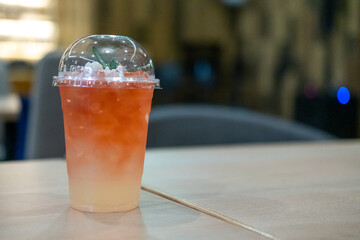 Tropical drink juice on the wooden table