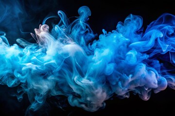 Fototapeta premium Ethereal Aerial Photography of Abstract Blue Smoke Swirling on Black Background, Capturing the Mystical Movement of Smoke Rolling Low Across the Ground