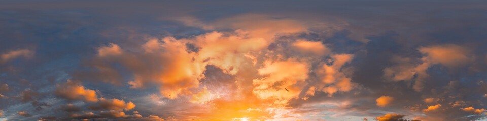 360 panorama of glowing sunset sky with bright pink Cumulus clouds. HDR 360 seamless spherical panorama. Full zenith or sky dome sky replacement for aerial drone panoramas. Climate and weather change.