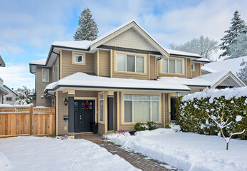 A perfect neighborhood. Entrance of nice residential house in snow