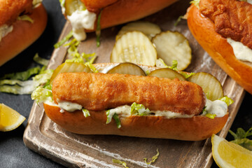 Fish finger hot dogs with gherkin and tartar sauce