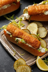 Fish finger hot dogs with gherkin and tartar sauce