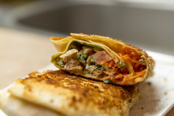 Shawarma with chicken and vegetables. Food concept