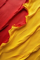 Celebration of spanish language day with red and yellow fabric waves