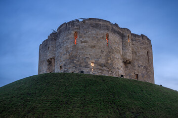 York Castle known as Cliffords Tower at dawn, England, UK.