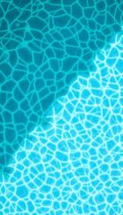 Obraz premium Pool water caustics texture from above. Top view of ripple pattern. Summer tropical travel background