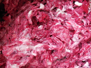 Obraz premium A dish with mayonnaise and beetroot, cooking.beautiful bright background.