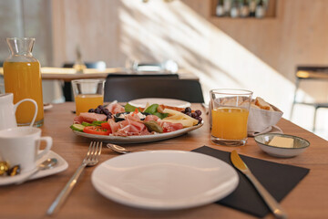 Breakfast at glamping resort restaurant surrounded by beautiful nature.