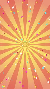カラフルな紙吹雪と右回転するサンバーストのループ動画（オレンジ）【縦長ビデオ】