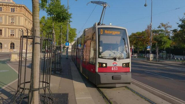 A tram passing through the streets of Vienna, Austria, on a quiet morning