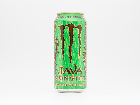 DRESDEN, GERMANY - 29. November 2024: Monster Java Irish Creme beverage. The energy drink is a blend with creamy Irish coffee. The can design is a textured green with a brown claw.