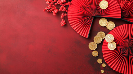 Red fans and gold coins on a textured crimson background, evoking cultural elegance and celebratory spirits.