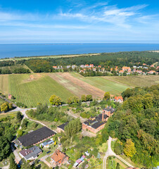 The village of Kadyny, view of its western part, the old brickyard and the Vistula reservoir, late summer, northern Poland