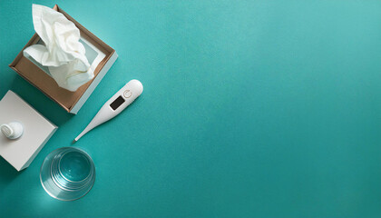 Bedside table flatlay featuring a digital thermometer, tissue box, and glass of water for a cozy, health-focused environment