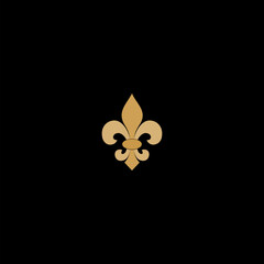  Fleur de lis gold icon isolated on dark background © sljubisa