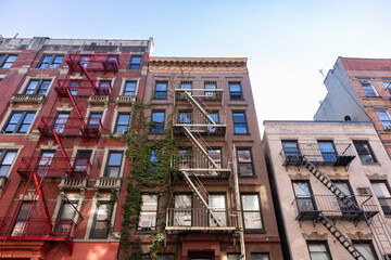 Colorful Old Residential Buildings with Fire Escapes in SoHo of New York City