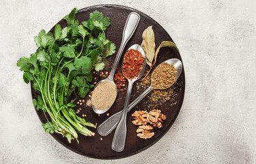 Georgian spices in spoons, on ketsi, top view, no people,