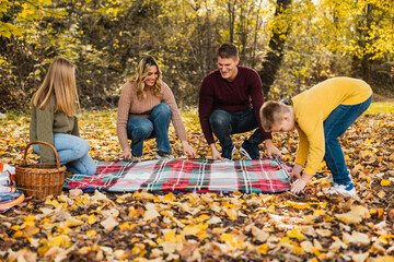 Family Having Picnic In Park