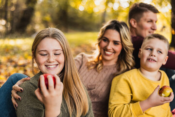 Girl With Apple Enjoying With Her Family